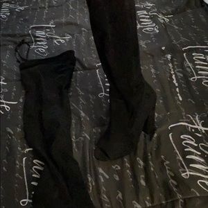 Thigh high boot heels
